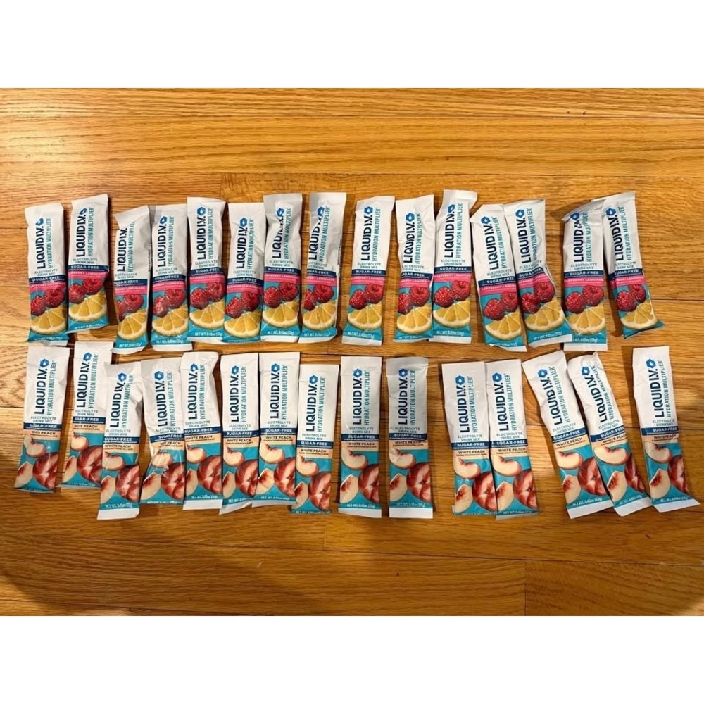 Liquid IV hydration electrolyte mix sugarfree packets white peach berry lemonade